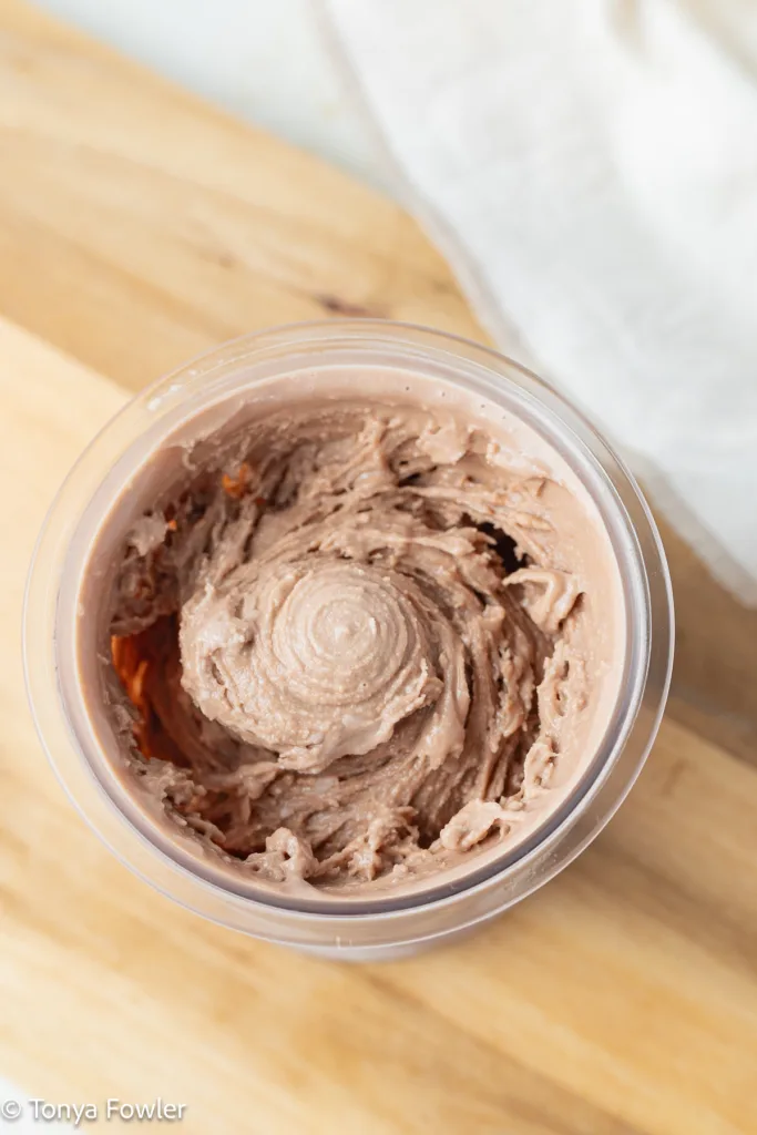Blended ice cream in a pint container.