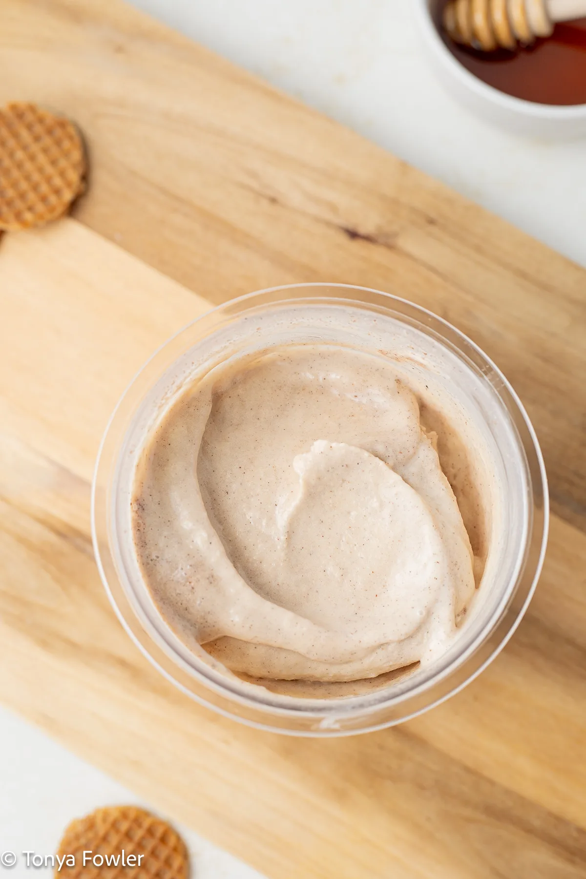 Ice cream in a pint container.