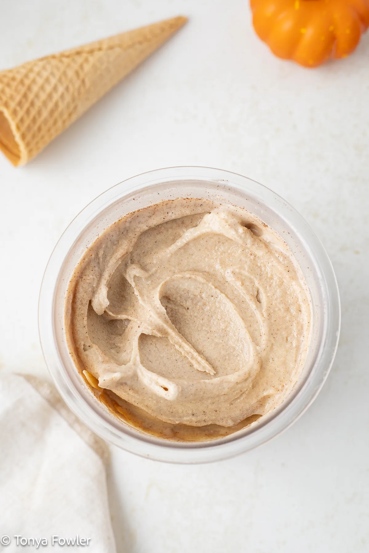 Smoothed out ice cream in a container.