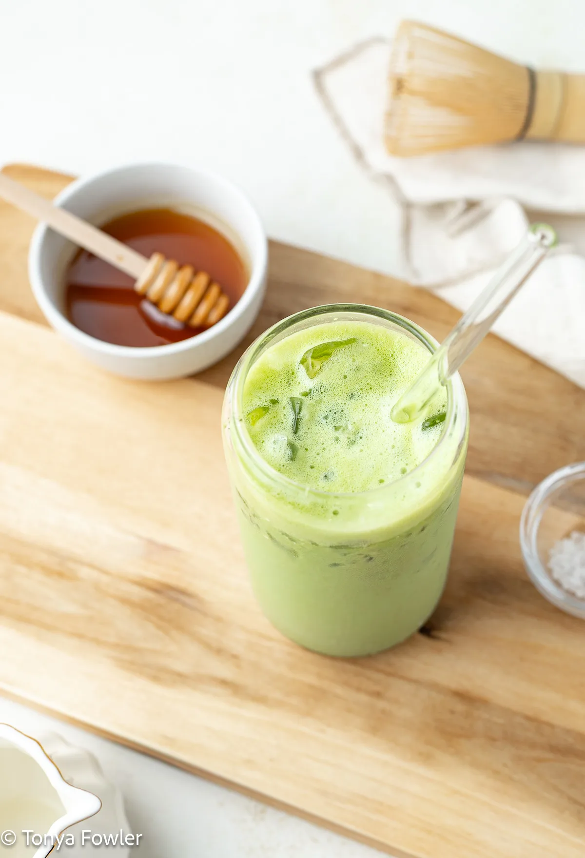 3/4 view of a salted honey matcha latte.