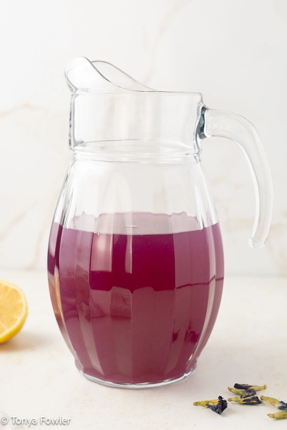 A pitcher of butterfly pea flower lemonade. 