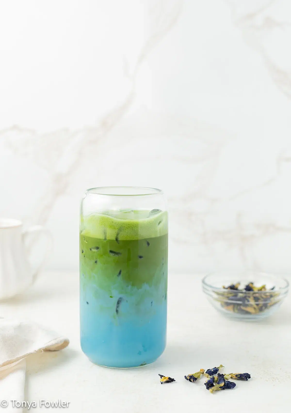 Butterly Pea Flower Matcha Latte in a glass.